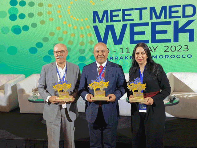 Jordan Renewable Energy and Energy Efficiency Fund representatives receiving the Mediterranean Climate Change Adaptation Award on Wednesday (Petra photo)