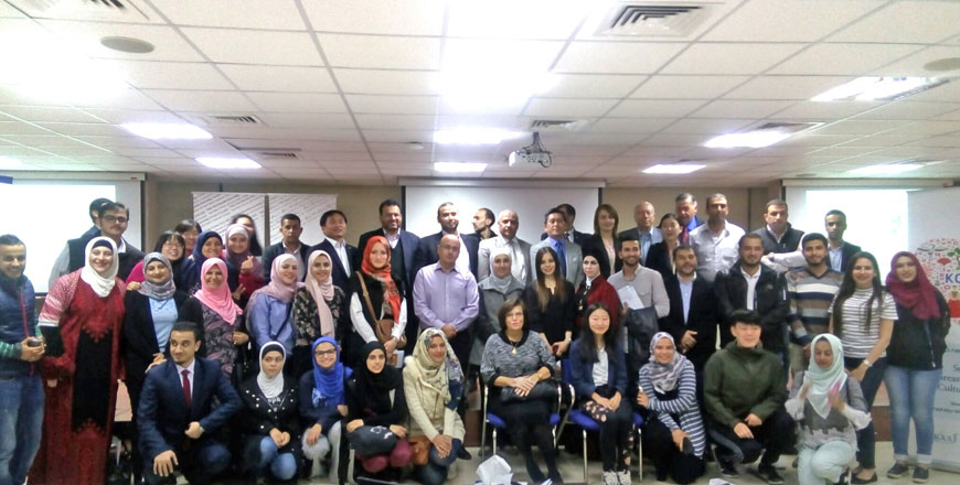 Participants at a meeting organised by the Korea International Cooperation Agency at the Talal Abu Ghazaleh Knowledge Forum pose for a group photo on Thursday (Photo by Andrea Celeste)