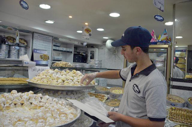 Maamoul (cookies filled with dates) pistachios or walnuts,  is an essential part of eid  (File photo)