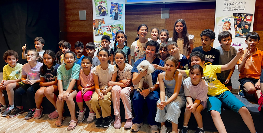 Veterinarian Silvia Zayadin with children at the Children’s Museum Jordan (Photo courtesy of Al Marji’ Publications)