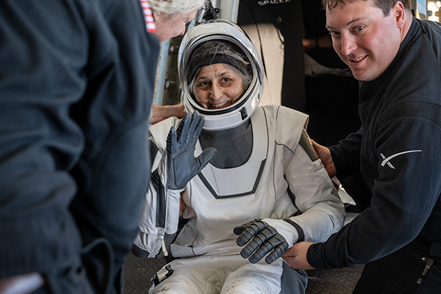 his photo provided by NASA shows NASA astronaut Suni Williams being helped out of a SpaceX Dragon spacecraft on board the SpaceX recovery ship MEGAN after she, NASA astronauts Nick Hague, Butch Wilmore, and Roscosmos cosmonaut Aleksandr Gorbunov landed in the water off the coast of Tallahassee, Florida yeserday (AFP photo)