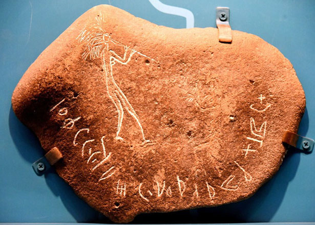   Inscription found in eastern Jordan reads: ‘By Aqraban, son of Kasit, son of Saad, the beautiful woman, playing the reed pipes’, circa 100 BC to 100 AD (Photo courtesy of the Jordan Museum)