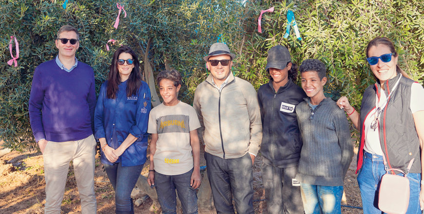 Participants during a ribbons ceremony to mark World Olive Tree Day at a farm in Madaba (Photo courtesy of From Farm to Fork in Jordan)