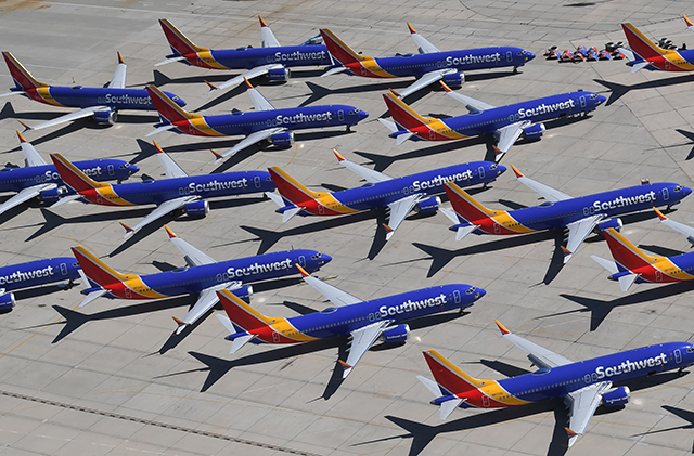Southwest Airlines Boeing 737 MAX aircraft are parked on the tarmac after being grounded, at the Southern California Logistics Airport in Victorville, on March 28, 2019 (AFP photo)