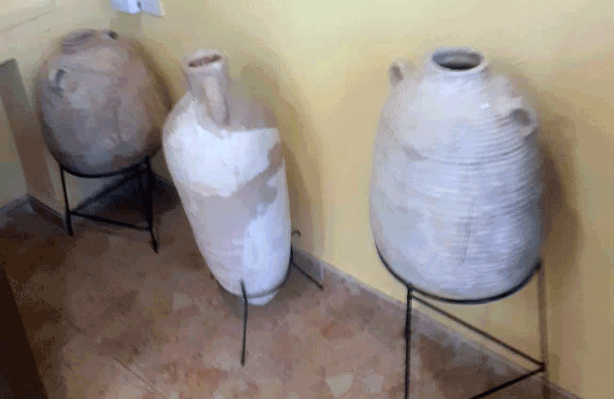 The collection of ancient vessels used for the storage of grain and olive oil displayed at the Archaeology Museum at the University of Jordan (Photo by Saeb Rawashdeh)