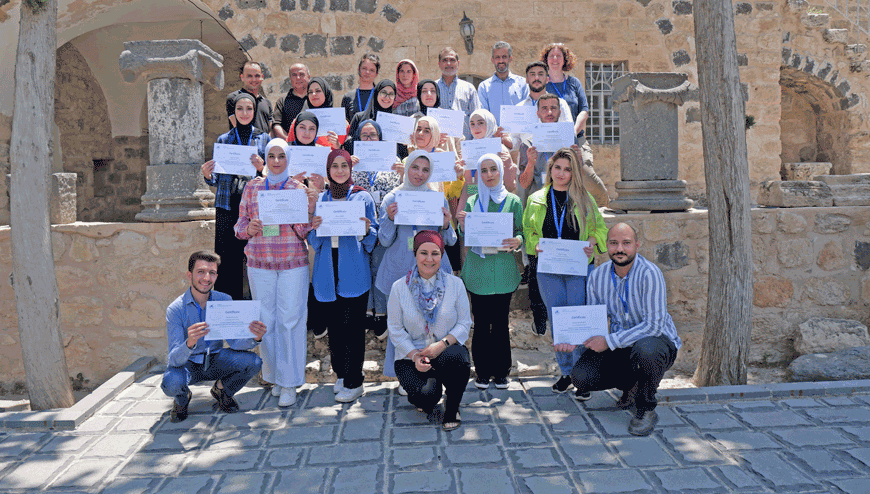 Participants of the German Archaeological Institute’s summer school in Umm Qais, course instructors, representatives of the Department of Antiquities and Yarmouk University pose for a photo (Photo courtesy of DAI)