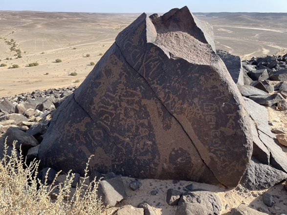 The Jabel Qurma range contains thousands of petroglyphs accompanied with safaitic script (Photo courtesy of Jabel Qurma Archaeological Landscape Project)