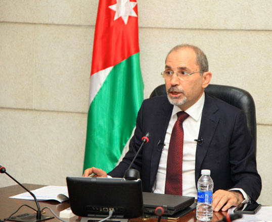 Foreign Minister Ayman Safadi speaks at a virtual meeting of foreign ministers and representatives of UN agencies hosted by Turkish Foreign Minister Mouloud Gawish Oglu on Tuesday (Photo courtesy of Foreign Ministry)