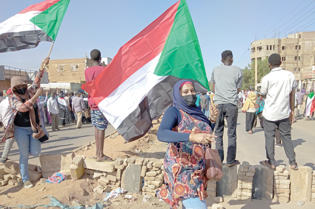 Sudanese anti-coup protesters in Omdurman on Wednesday, when thousands took to the streets (AFP photo)