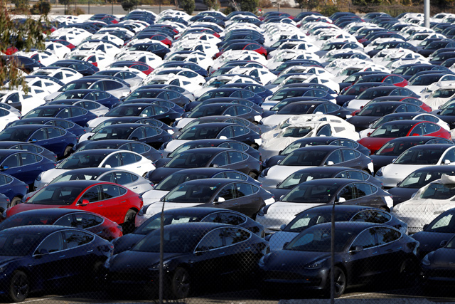 A parking lot of predominantly new Tesla Model 3 electric vehicles is seen in Richmond, California, US, on June 22 (Reuters file photo)