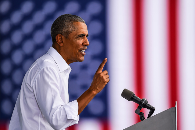 Former US president Barack Obama speaks at a Biden-Harris drive-in rally in Miami, Florida, on Saturday (AFP photo)