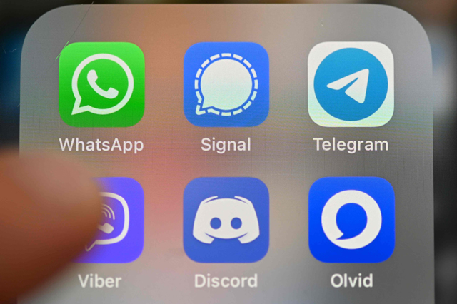 In this file photo taken on January 22, 2021 shows a smartphone screen featuring messaging service applications WhatsApp, Signal, telegram, Viber, Discord and Olvid (AFP photo)