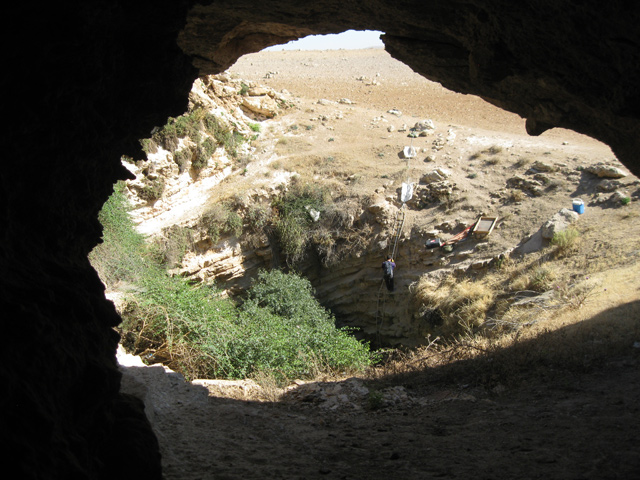 In this undated photo, a limestone sinkhole site near the Dead Sea’s, being investigated for skeletal remains and other data on Jordanian prehistory, can be seen (Photo courtesy of James Pokines)