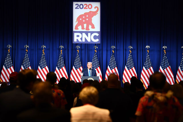 US President Donald Trump speaks as delegates gather during the first day of the Republican National Convention in Charlotte, North Carolina, on Monday (AFP photo)