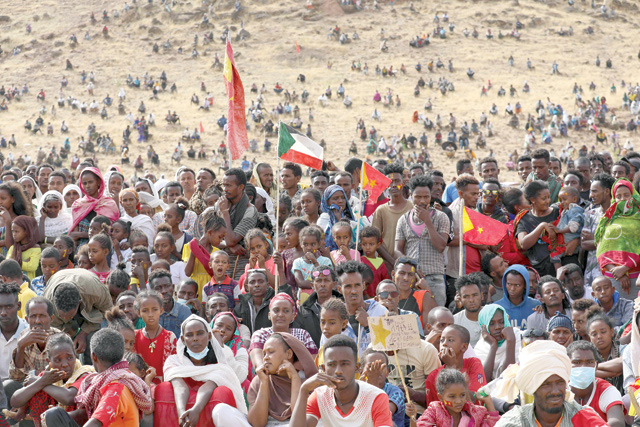 In this file photo taken on February 18, Ethiopian refugees gather to celebrate the 46th anniversary of the Tigray People's Liberation Front at Um Raquba refugee camp in Gedaref, eastern Sudan (AFP photo)