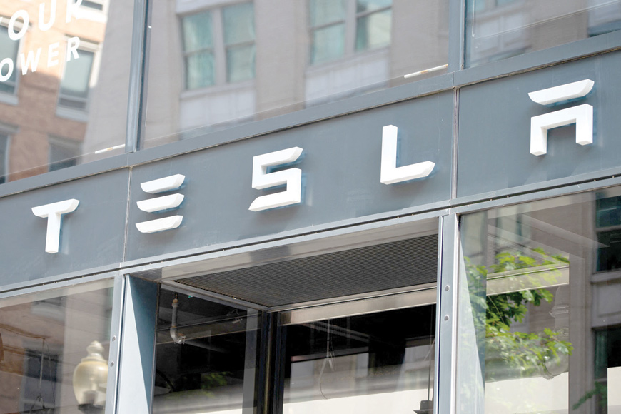 In this file photo, the inside of a Tesla car Model 3 is seen at a Tesla shop inside of a shopping Mall in Beijing, on May 26 (AFP photo)