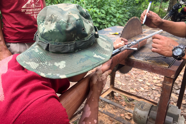 Members of the People's Defence Force make handmade guns to be used in fighting against security forces near Demoso, Kayah state on June 4, as the country remains in turmoil after the February military coup (AFP photo)