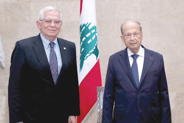 This handout photo provided by the Lebanese photo agency Dalati and Nohra shows Lebanese President Michel Aoun (right) welcoming the European Union High Representative for Foreign Affairs and Security Policy Josep Borell, at the presidential palace in Baabda, east of the capital Beirut, on Saturday (AFP photo)