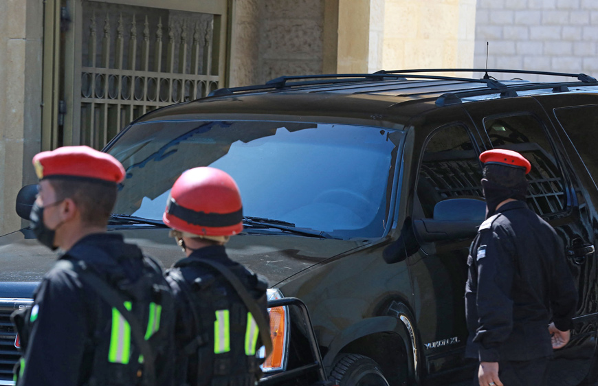 A vehicle with tinted windows leaves the State Security Court on Monday (AFP photo)