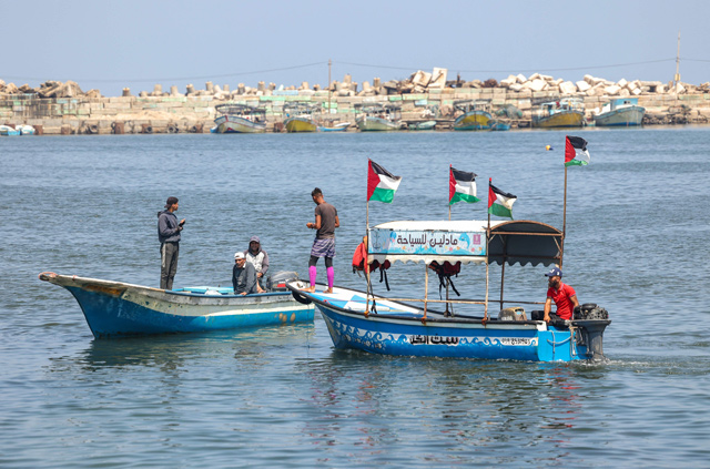 Palestinian fishermen are pictured during a protest against the blockade on Gaza at the port of Gaza City on Sunday (AFP photo)