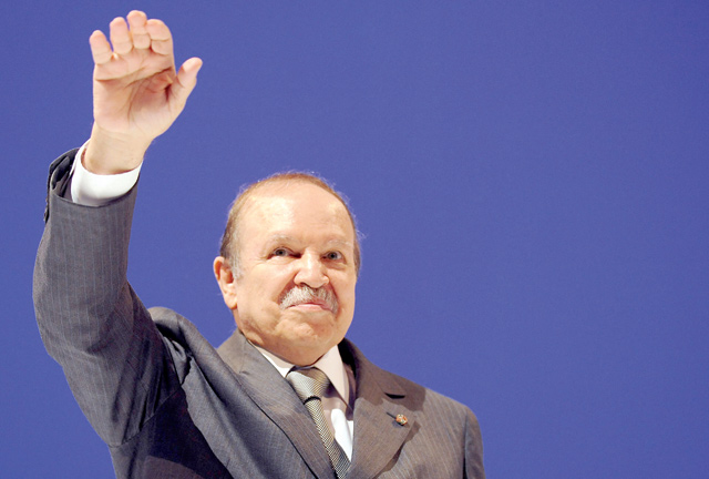 In this file photo taken on April 6, 2009, Algerian President Abdelaziz Bouteflika waves to his supporters during his last election meeting in Algiers (AFP photo)