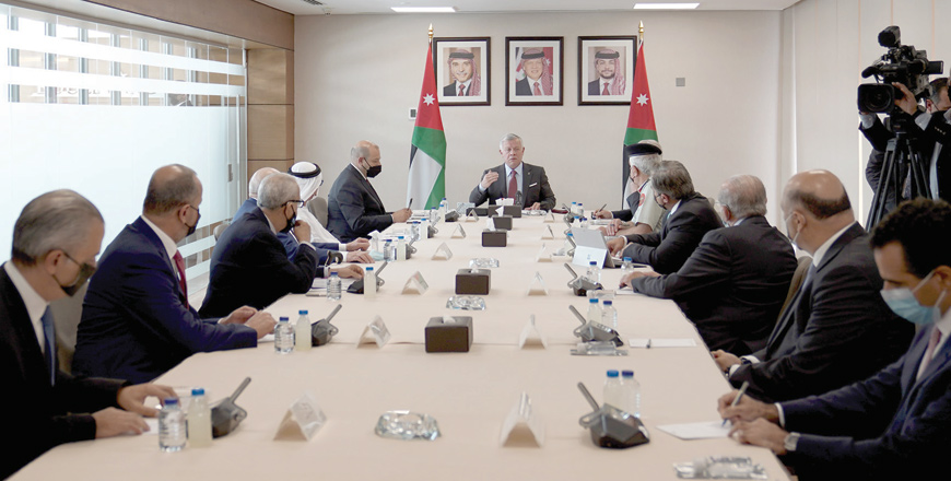 His Majesty King Abdullah speaks during a meeting with a number of Jordanian and Arab investors during a visit to the Abdali project on Sunday (Photo courtesy of Royal Court)
