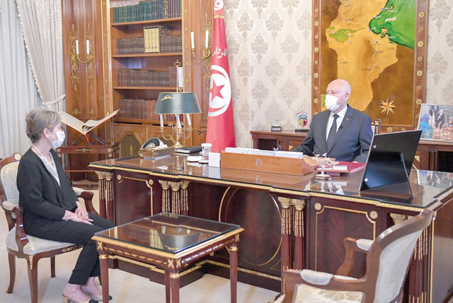This handout photo provided by the Tunisian presidency's official Facebook page on Wednesday shows President Kais Saied and Najla Bouden during a meeting in the capital Tunis (AFP photo/ ho/presidency press service)