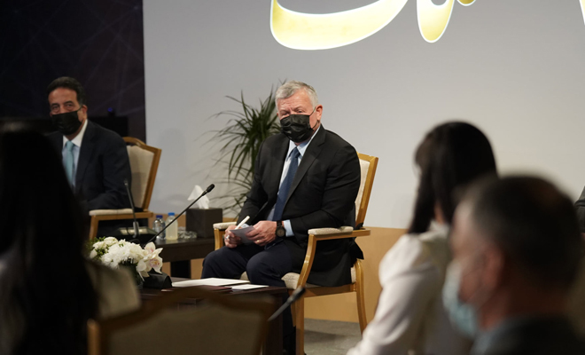 His Majesty King Abdullah attends an event marking the 20th anniversary of the King Abdullah II Fund for Development at the King Hussein Bin Talal Convention Centre at the Dead Sea on Monday (Photo courtesy of Royal Court)
