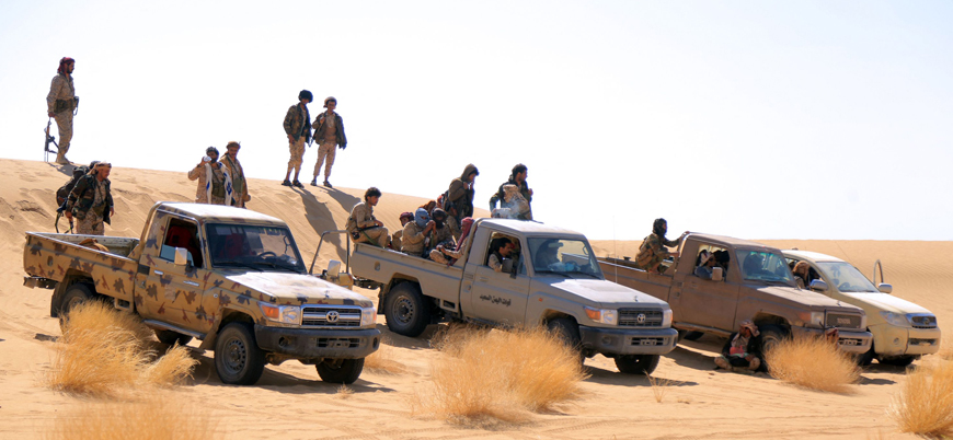 Fighters loyal to Yemen's Saudi-backed government take positions at the Al Jawba frontline facing Iran-backed Houthi rebels in the country's north-eastern province of Marib, the last remaining government stronghold in northern Yemen, on Friday (AFP photo)