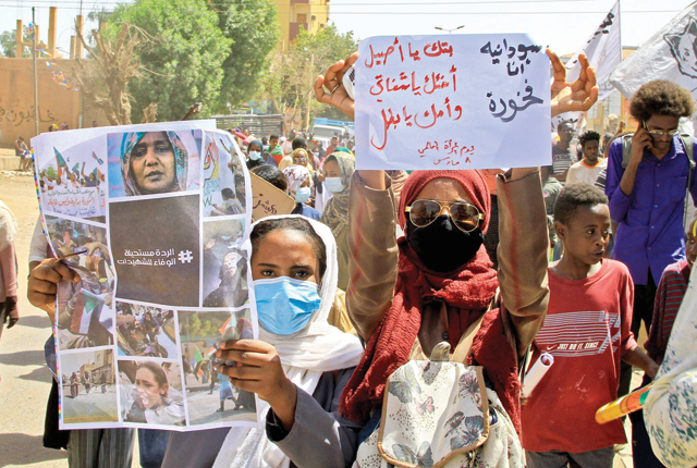 Sudanese rally to mark the International Women's Day in Sudan's capital Khartoum, on Tuesday (AFP photo)