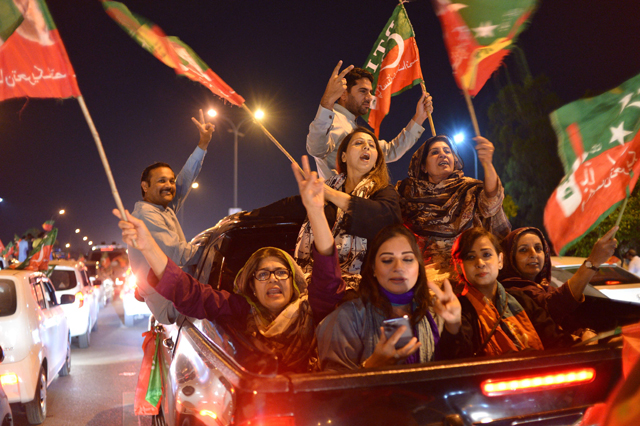 Supporters of Pakistan Tehreek-e-Insaf party of dismissed Pakistan's prime minister Imran Khan take part in a rally in his support in Islamabad on Sunday (AFP photo)
