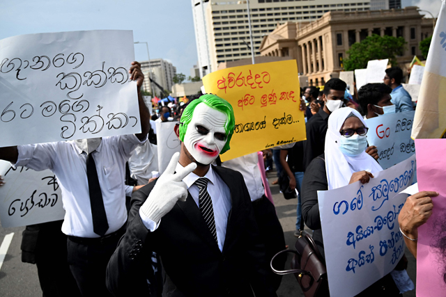 Sri Lankan lawyers take part in a demonstration against the economic crisis at the entrance of the president's office in Colombo, on Tuesday (AFP photo)