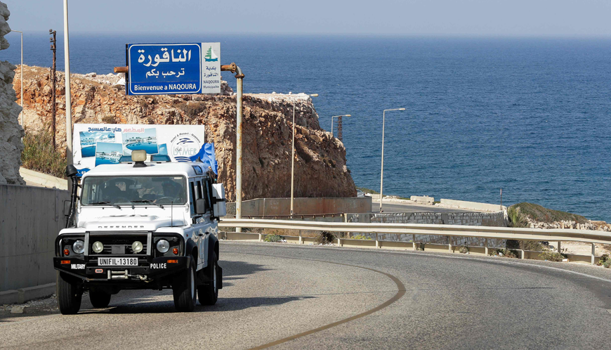 In this file photo taken on October 3, a United Nations peacekeeping force vehicle drives on the coastal road of Naqura, the southernmost Lebanese town by the border with Israel (AFP photo)