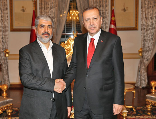 Turkey’s President Recep Tayyip Erdogan and Palestinian Hamas leader Khaled Mishaal (left) pose for a photo in Istanbul on Saturday (AP photo)