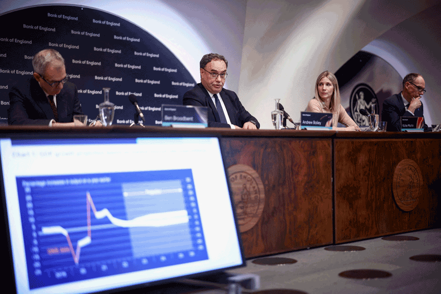 The Bank of England's Deputy Governor Monetary Policy, Ben Broadbent, Governor of the Bank of England Andrew Bailey, Head of Media and Stakeholder Engagement Katie Martin and Deputy Governor Markets and Banking, Dave Ramsden address the media during the Monetary Policy Report press conference at the Bank of England, in London, on Thursday (AFP photo)