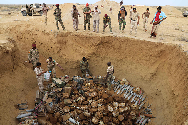 A joint Saudi-backed Sudanese-Yemeni military experts force removes and deactivates some 5,000 landmines on January 30, 2021, which they said were planted by the Iran-aligned Houthi rebels in Yemen's northern coastal town of Midi, located in conflict-ridden Hajjah governorate near the border with Saudi Arabia on the Red Sea (AFP photo)