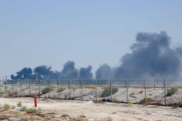 Smoke billows from an Aramco oil facility in Abqaiq, about 60km southwest of Dhahran, in Saudi Arabia's eastern province on Saturday (AFP photo)