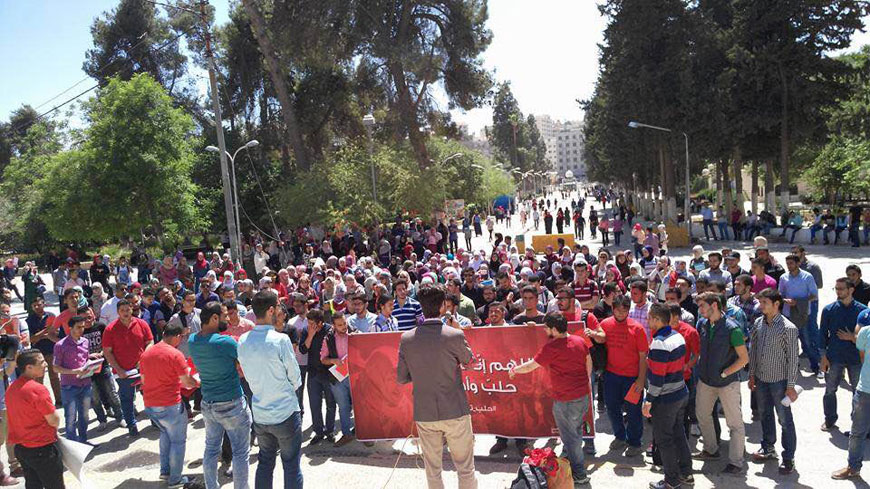 University students participate in a rally to express solidarity with Syrians in Aleppo on campus at the University of Jordan in Amman on Monday (Photo courtesy of UJ Student Union)