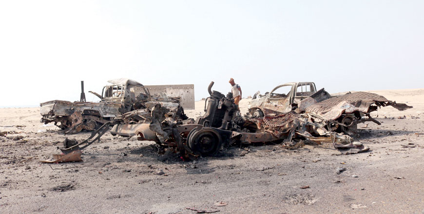 This photo taken on Friday shows burnt out vehicles reportedly belonging to pro-government troops following Thursday's air strikes by Emirati forces on Yemen's interim capital Aden (AFP photo)