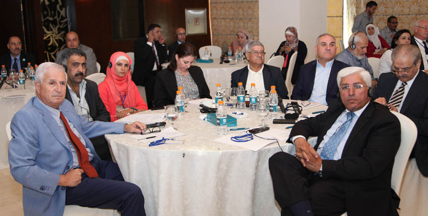 Representatives of political parties attend a conference in Amman on Monday (Petra photo)
