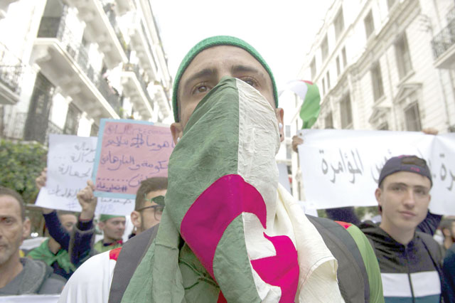 Algerian students demonstrate in the capital Algiers against President Abdelaziz Bouteflika on Tuesday (AFP photo)