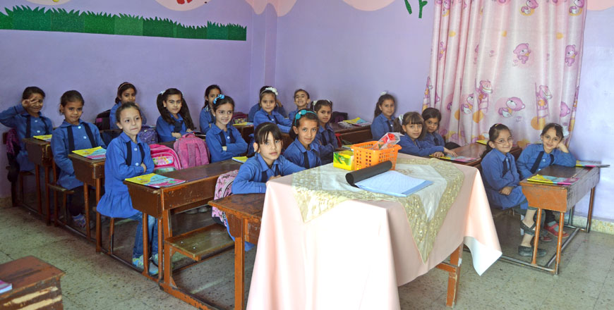 Students attend a class at a school in Zarqa, 22km east of Amman, recently (Photo by Khetam Malkawi)