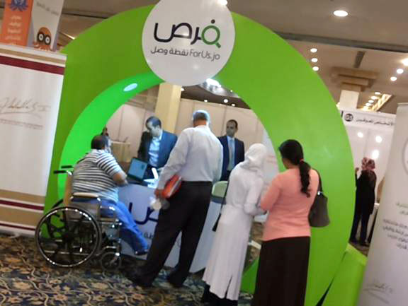 Job seekers visit a recruitment fair for people with disabilities in Amman on Monday (Photo by Sawsan Tabazah)