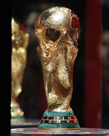 The FIFA World Cup Trophy is unveiled in Amman on Tuesday (Photo by Osama Aqarbeh)