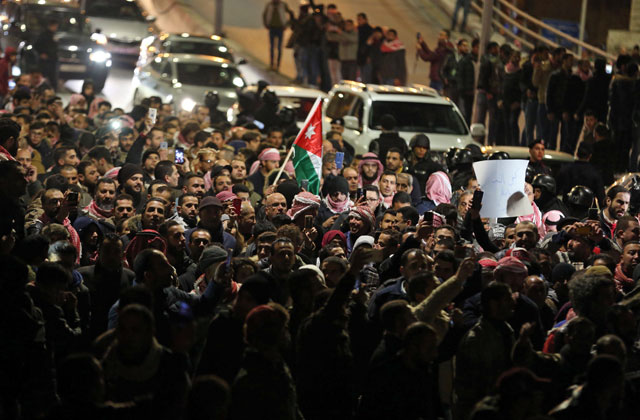Jordanians demand constitutional reforms and release of political detainees during a protest near the Fourth Circle in Amman on Thursday (AFP photo)