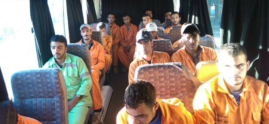 Greater Amman Municipality sanitation workers ride a bus to head to their work locations (Photo courtesy of GAM)