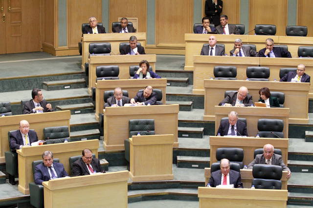 Lawmakers are seen during a Lower House session on Sunday in Amman (Petra photo)