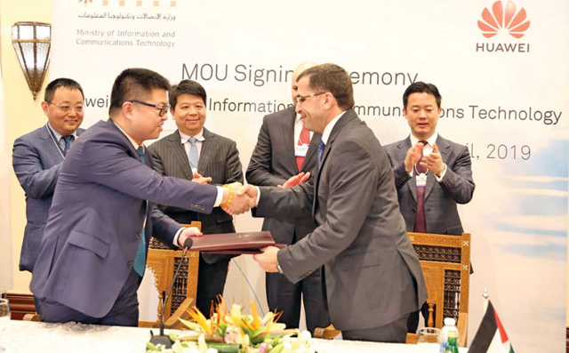 Representatives from the ICT Ministry and Huawei Technologies sign a memorandum of understanding to enhance cooperation in developing the capabilities of young leaders and employees in the Kingdom’s technology sector on Sunday (Petra photo)