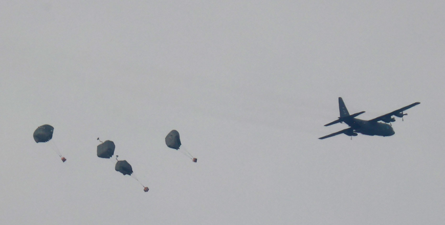A Jordanian military aircraft drops humanitarian aid over Rafah in the skies of the southern Gaza Strip on Monday (AFP photo)
