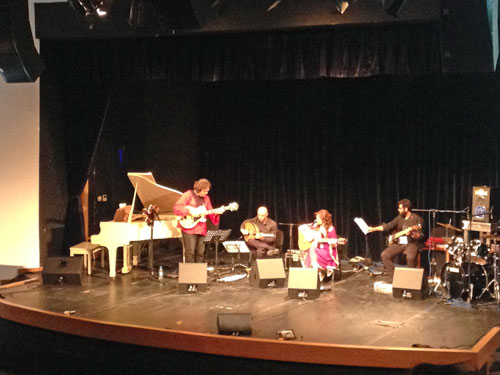 Farah Siraj (second from right) and an accompanying band perform at the Haya Cultural Centre on Sunday  (Photo by Muath Freij)